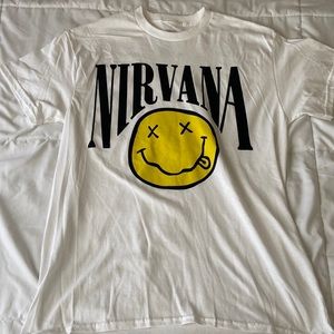 This is a medium sized Nirvana white t-shirt.